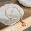 Peach Charm Pearl Bracelet