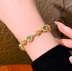 Enchanted Emerald Collection | Forest-Inspired Floral Bracelet with Green Stone & Zircon